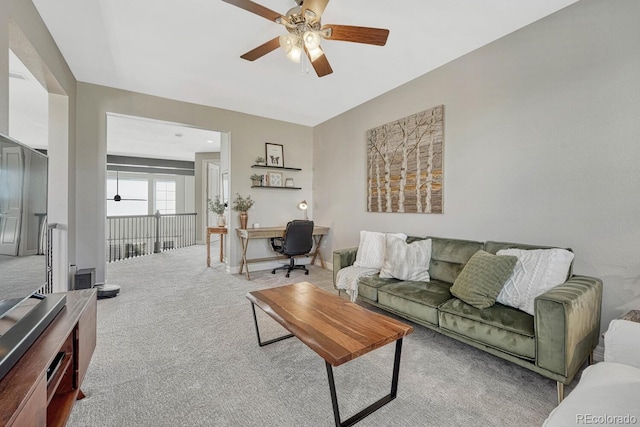 26566 E Peakview Dr, Aurora, CO 80016 - living room featuring carpet floors, a ceiling fan, and baseboards