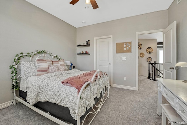 26566 E Peakview Dr, Aurora, CO 80016 - bedroom featuring light colored carpet, a ceiling fan, and baseboards