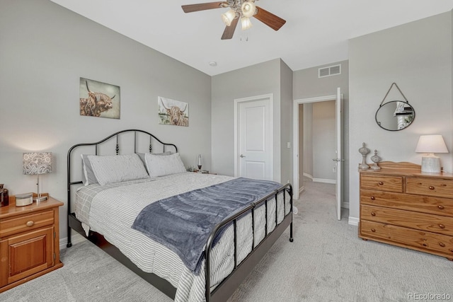 26566 E Peakview Dr, Aurora, CO 80016 - bedroom with visible vents, baseboards, ceiling fan, and light carpet