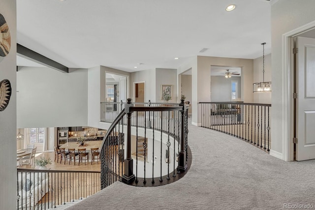 26566 E Peakview Dr, Aurora, CO 80016 - hall with baseboards, recessed lighting, carpet floors, and an upstairs landing