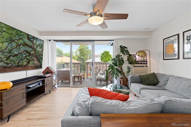 1150 Vine St Unit 306, Denver, CO 80206 - living area featuring light wood-style floors, ceiling fan, and cooling unit