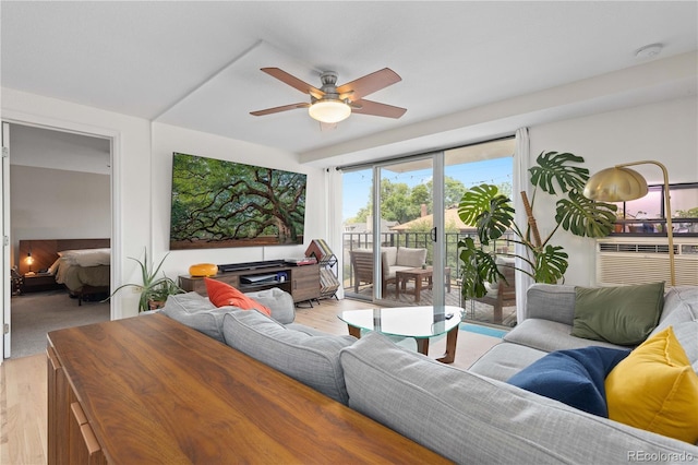 1150 Vine St Unit 306, Denver, CO 80206 - living area featuring a ceiling fan, light wood-type flooring, and cooling unit