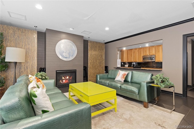 1150 Vine St Unit 306, Denver, CO 80206 - living room with a fireplace, recessed lighting, and ornamental molding