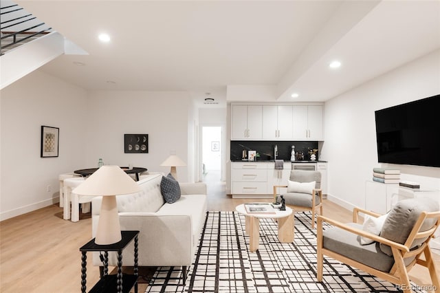 3130 Wyandot St, Denver, CO 80211 - living room featuring recessed lighting, light wood-type flooring, and baseboards