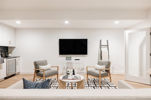 3130 Wyandot St, Denver, CO 80211 - living area with light wood-style floors, recessed lighting, wine cooler, and baseboards