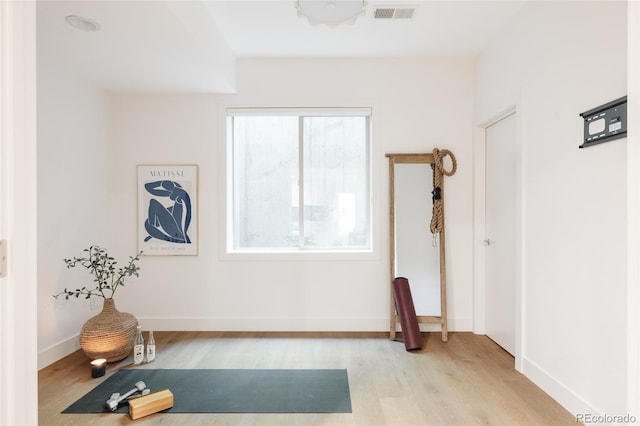 3130 Wyandot St, Denver, CO 80211 - workout room featuring light wood finished floors and baseboards
