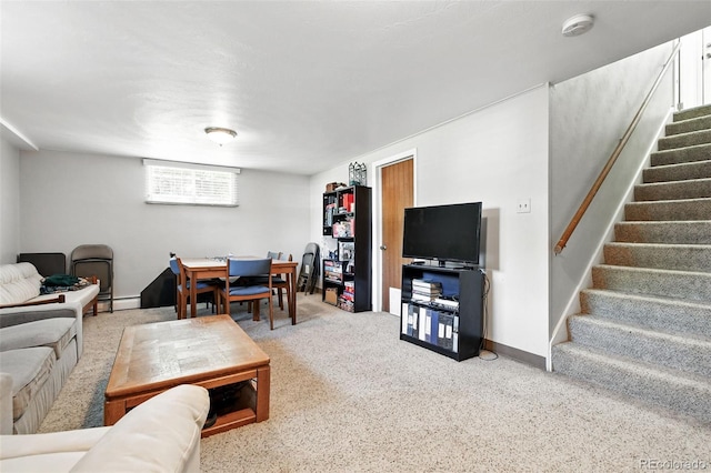 3691 Allison St, Wheat Ridge, CO 80033 - carpeted living room featuring baseboard heating, stairs, and baseboards