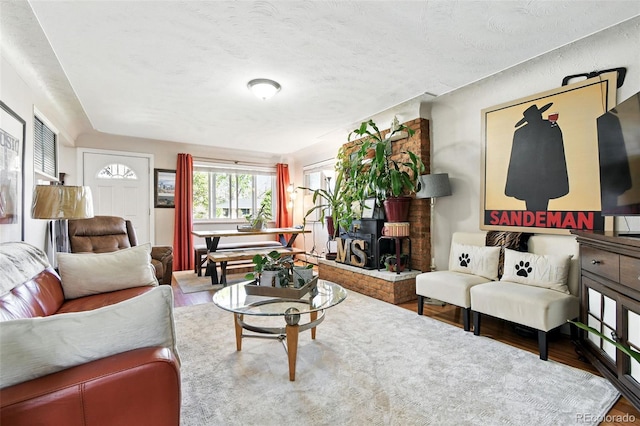 3691 Allison St, Wheat Ridge, CO 80033 - living room with wood finished floors and a wood stove