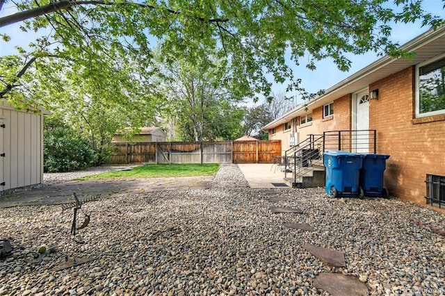 3691 Allison St, Wheat Ridge, CO 80033 - fenced backyard with a patio
