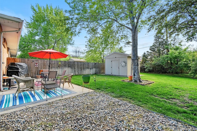 3691 Allison St, Wheat Ridge, CO 80033 - view of yard featuring a shed, an outdoor structure, and a patio