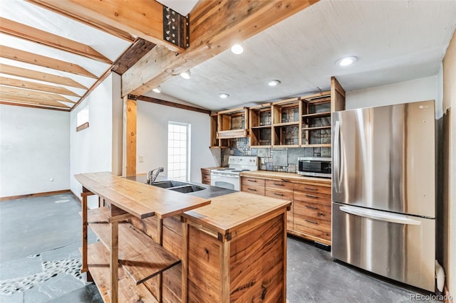 kitchen with appliances with stainless steel finishes, tasteful backsplash, custom exhaust hood, sink, and lofted ceiling with beams