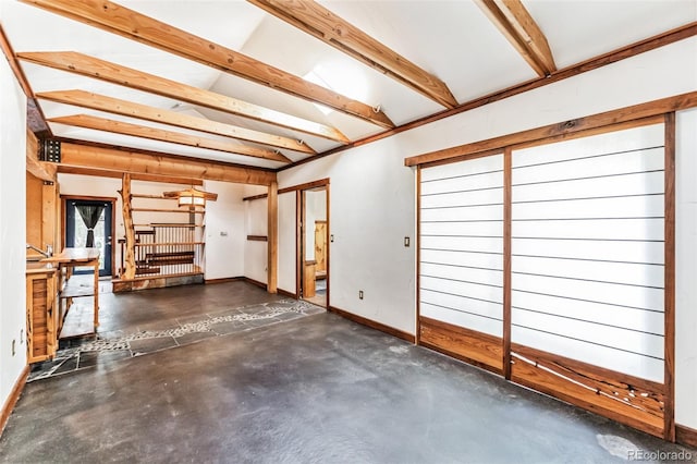 interior space featuring baseboards