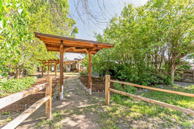 view of yard with a pergola