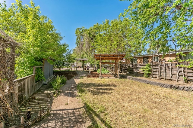 view of yard with fence