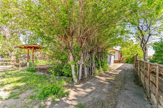 view of yard with fence