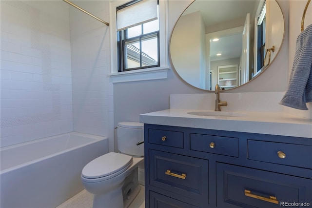 bathroom with vanity, toilet, and shower / washtub combination