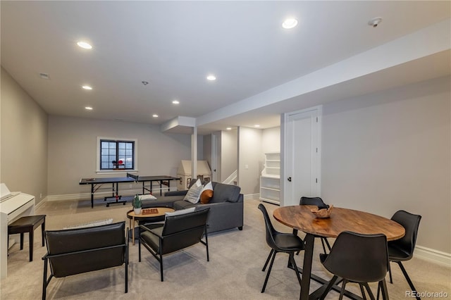 living room with baseboards, recessed lighting, light carpet, and stairway