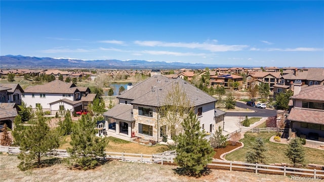 bird's eye view featuring a residential view and a mountain view