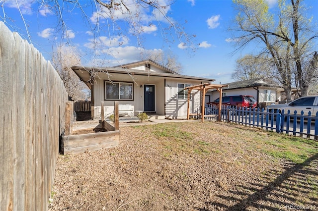 1940 Carmel Dr, Colorado Springs, CO 80910 - view of front of home with fence private yard