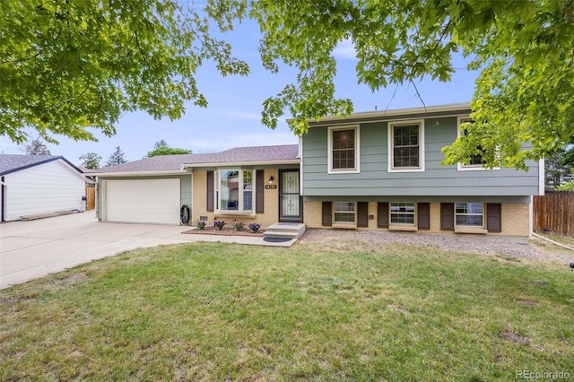 16135 E Baker Pl, Aurora, CO 80013 - tri-level home featuring brick siding, an attached garage, and concrete driveway