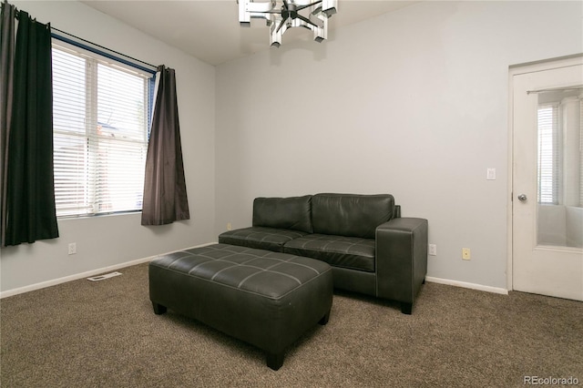 living room with carpet and plenty of natural light