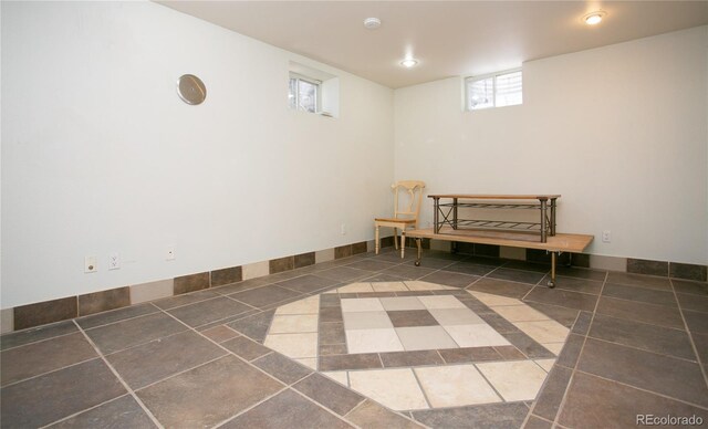 interior space featuring dark tile patterned floors