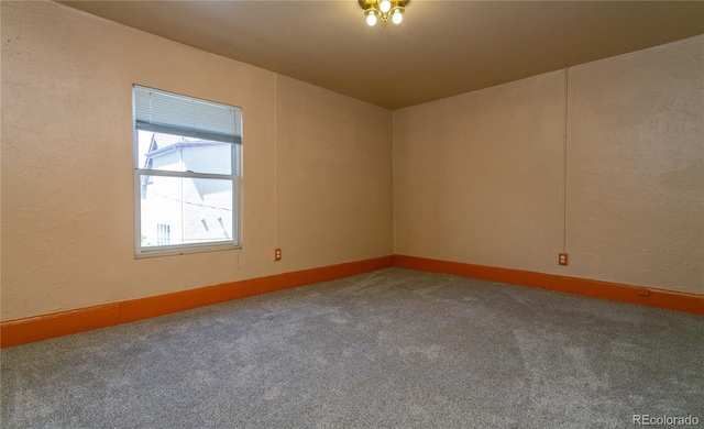 unfurnished room with carpet