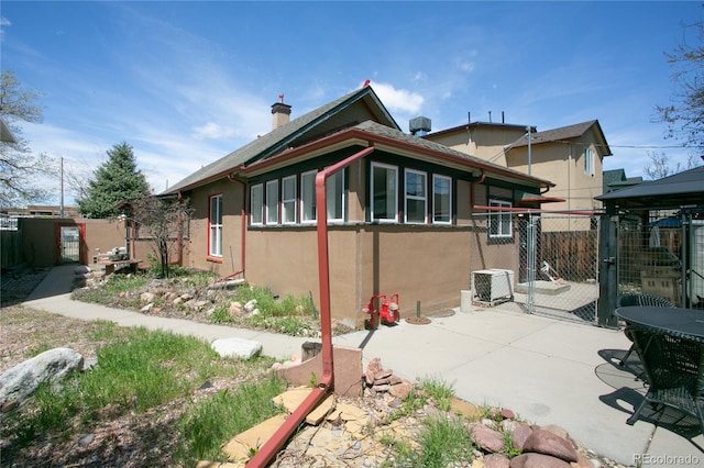 view of home's exterior with a patio area