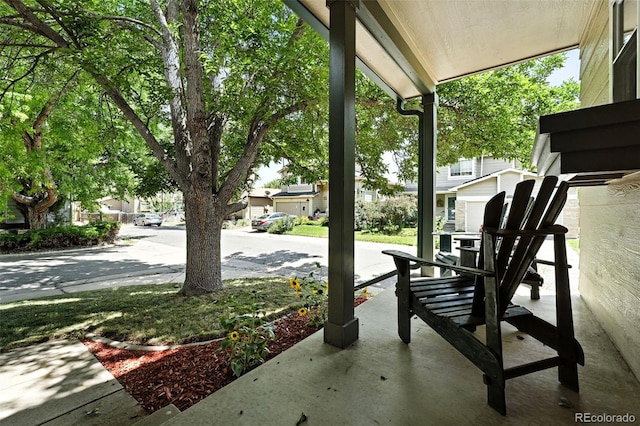 8468 S Upham Way, Littleton, CO 80128 - view of patio / terrace featuring a residential view