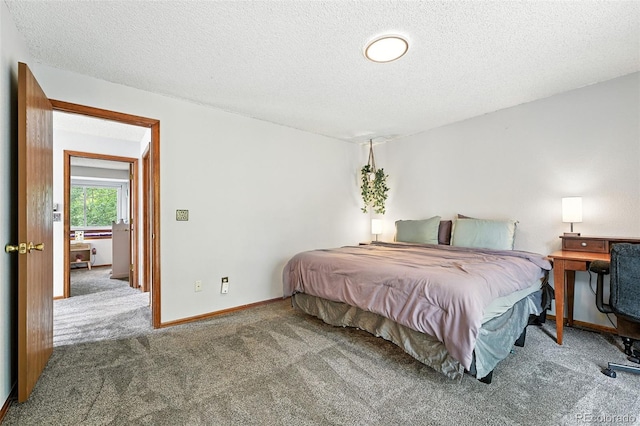 8468 S Upham Way, Littleton, CO 80128 - carpeted bedroom with a textured ceiling and baseboards