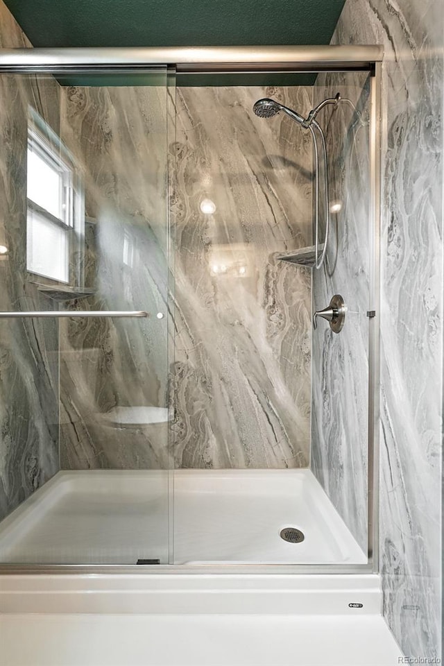 8468 S Upham Way, Littleton, CO 80128 - full bath featuring a marble finish shower