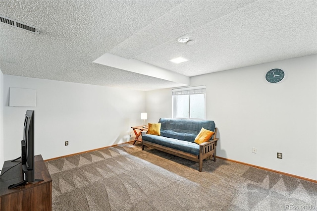 8468 S Upham Way, Littleton, CO 80128 - living area with carpet floors and a textured ceiling