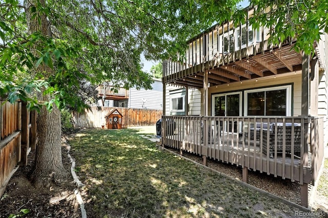 8468 S Upham Way, Littleton, CO 80128 - fenced backyard with a deck