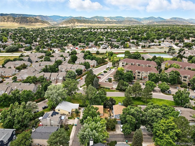 8468 S Upham Way, Littleton, CO 80128 - aerial perspective of suburban area featuring a mountain backdrop