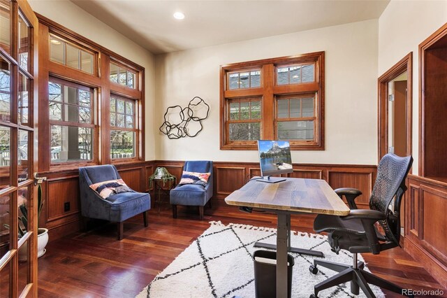 office with recessed lighting, dark wood finished floors, and a wainscoted wall