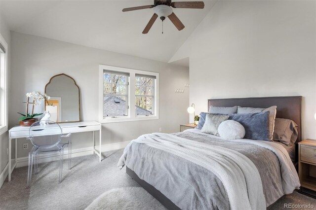 bedroom featuring baseboards, ceiling fan, carpet, and high vaulted ceiling