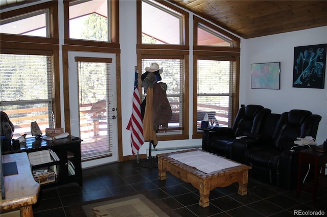 tiled living room featuring wooden ceiling, vaulted ceiling, and plenty of natural light