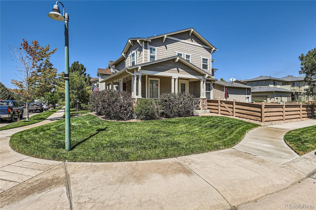 view of front of home with a front yard