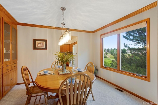3 Silverberry, Littleton, CO 80127 - dining area with light colored carpet and ornamental molding