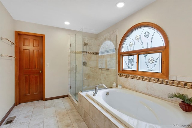 3 Silverberry, Littleton, CO 80127 - full bath featuring a bath, a stall shower, and recessed lighting
