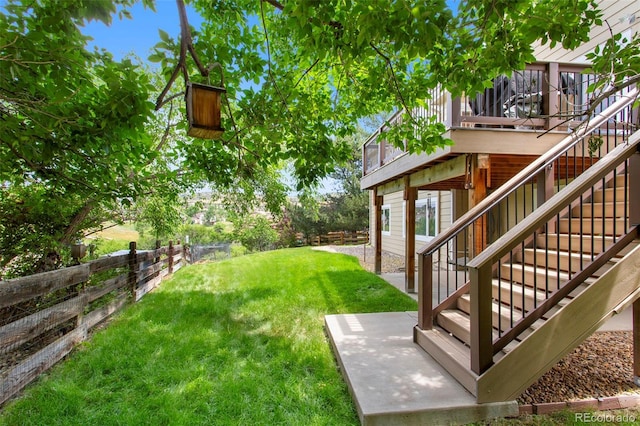3 Silverberry, Littleton, CO 80127 - view of yard with stairs, a wooden deck, and a patio area
