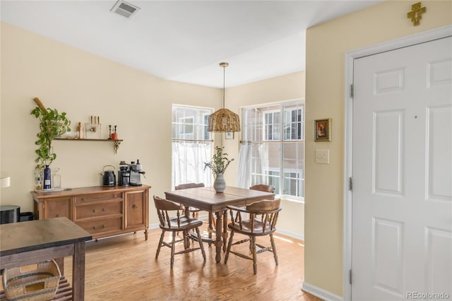 8405 Pebble Creek Way Unit 202, Highlands Ranch, CO 80126 - dining room featuring light wood-style flooring and baseboards