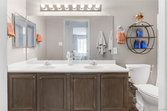 8405 Pebble Creek Way Unit 202, Highlands Ranch, CO 80126 - full bathroom with toilet and double vanity