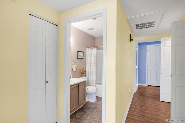 8405 Pebble Creek Way Unit 202, Highlands Ranch, CO 80126 - corridor with baseboards and dark wood-type flooring