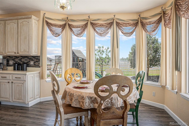 29751 E 163rd Pl, Brighton, CO 80603 - dining space with dark wood-style flooring, baseboards, and a textured wall