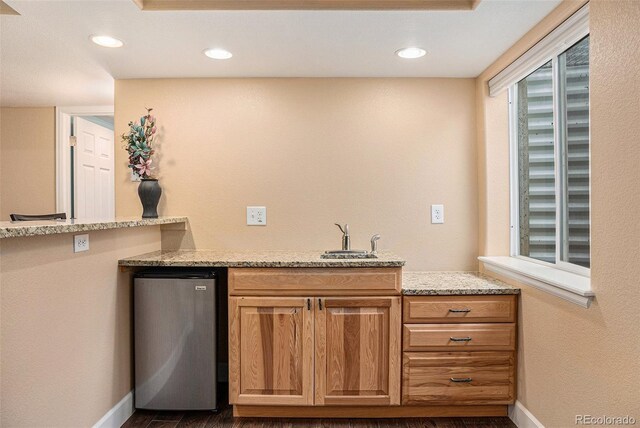 29751 E 163rd Pl, Brighton, CO 80603 - bar featuring recessed lighting, baseboards, fridge, a sink, and dark wood-style floors