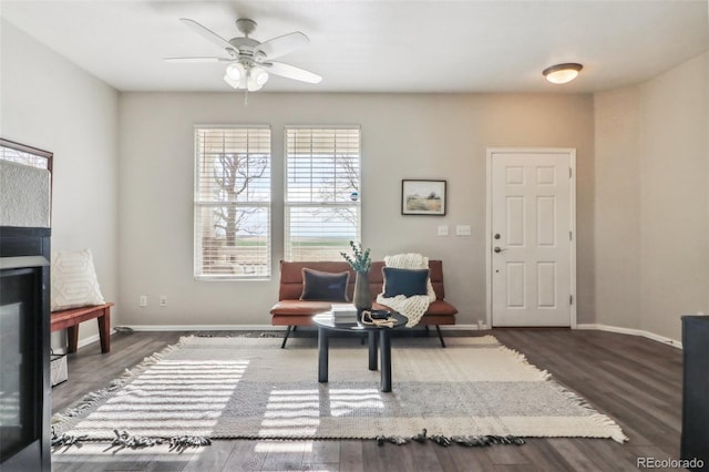 15612 E 96th Way Unit 13E, Commerce City, CO 80022 - sitting room with a ceiling fan, baseboards, and dark wood-style flooring