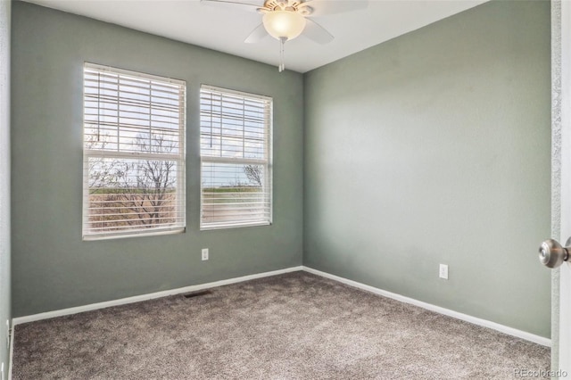 15612 E 96th Way Unit 13E, Commerce City, CO 80022 - carpeted spare room with a ceiling fan and baseboards