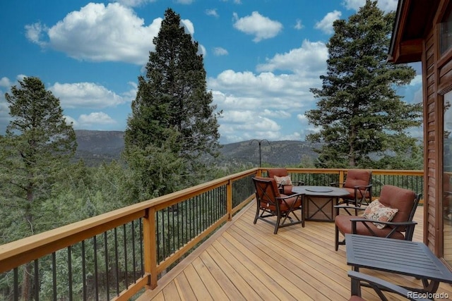 220 Long Ridge Dr, Bailey, CO 80421 - wooden deck with a mountain view