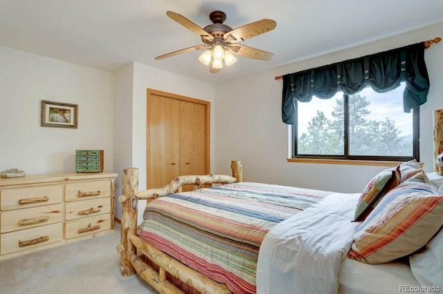 220 Long Ridge Dr, Bailey, CO 80421 - bedroom with light colored carpet, a closet, and a ceiling fan